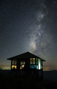 House against sky at night