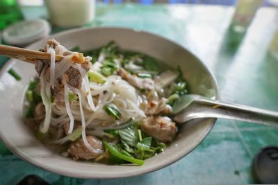 Close-up of noodles in bowl on table