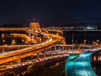 High angle view of illuminated bridge at night