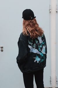 Woman standing in front of door