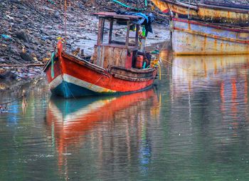 High angle view of boat moored in lake