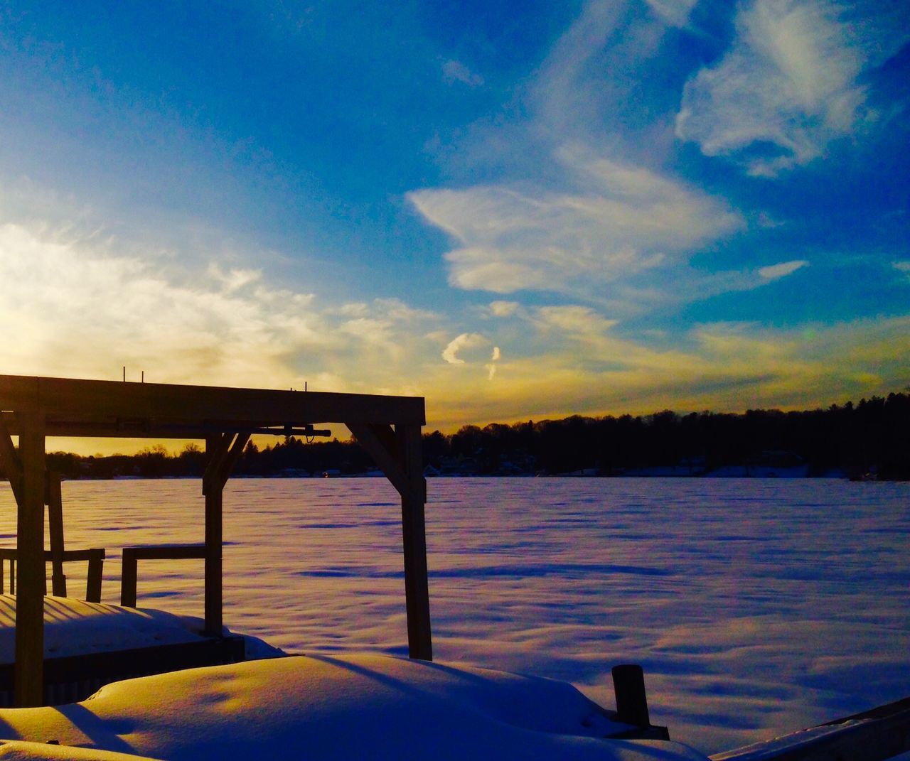 Frozen lake at sunset