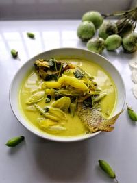 High angle view of fish fat curry in bowl