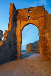 View of old ruins against clear sky