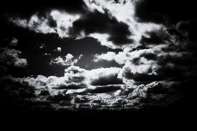 Scenic view of landscape against cloudy sky