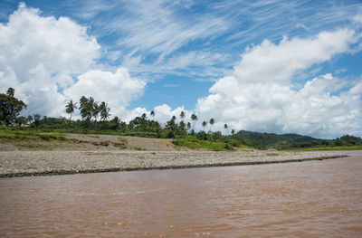 Scenic view of river against sky