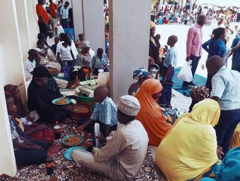 Crowd in traditional clothing