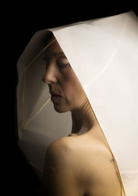 Woman in white paper hood iv