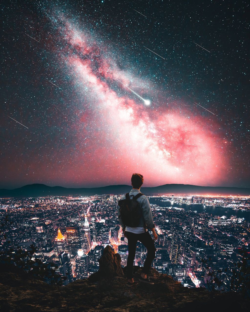 sky, real people, star - space, leisure activity, building exterior, architecture, rear view, cityscape, night, nature, city, one person, built structure, standing, lifestyles, beauty in nature, scenics - nature, men, full length, astronomy, outdoors, looking at view