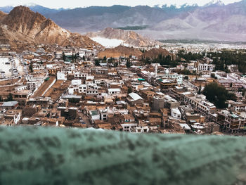 Aerial view of townscape and mountains