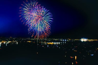 Firework display at night