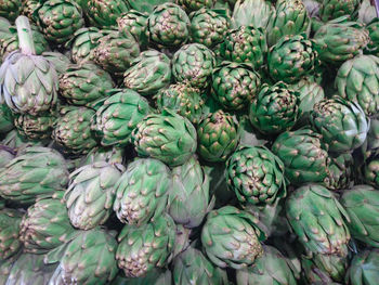 Full frame shot of artichokes for sale at market stall