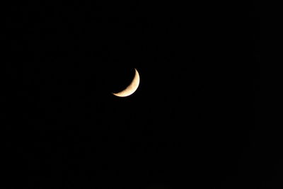 Scenic view of moon against clear sky at night