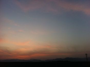 Scenic view of silhouette landscape against sky during sunset