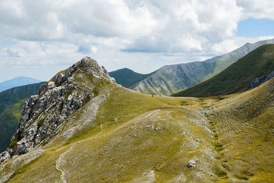 Scenic view of mountains against sky in montemonaco, marche italy