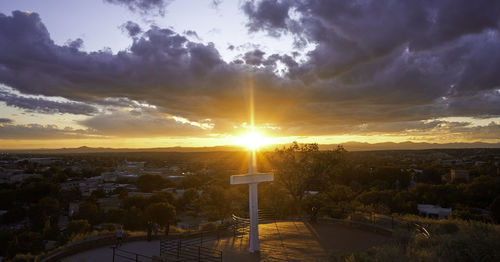 Scenic view of buildings against sky during sunset