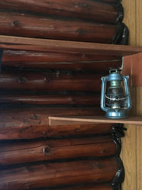 Close-up of empty glass bottle on table