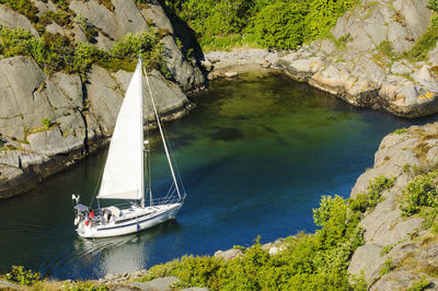 Sailing boat in small harbor