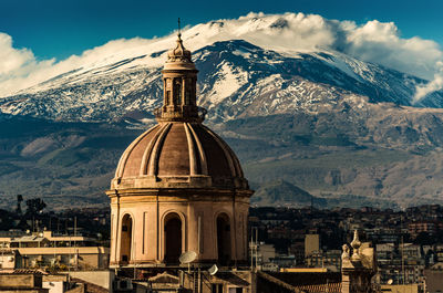 View of cathedral and buildings against sky