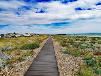 Narrow pathway along beach