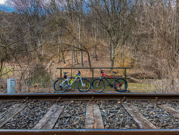 Bicycle parked on railroad track