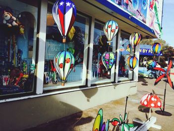 Multi colored flags for sale in store