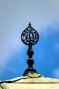 Low angle view of building against blue sky