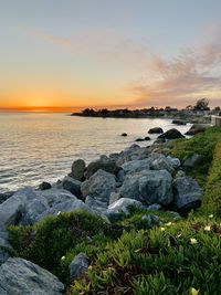 Scenic view of sea against sky during sunset