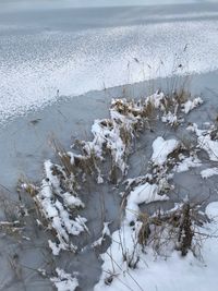 Scenic view of sea against sky during winter