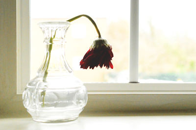 Flower vase on table