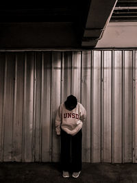 Full length of man standing with text