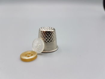 High angle view of drink on table against white background