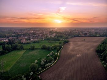 Scenic view of landscape against sky during sunset