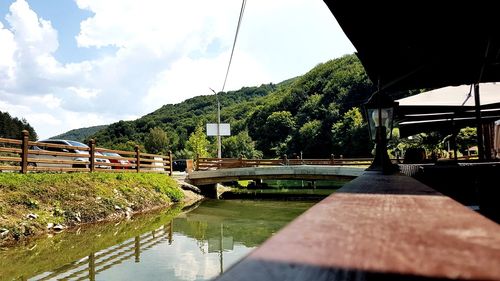 Bridge over river against sky