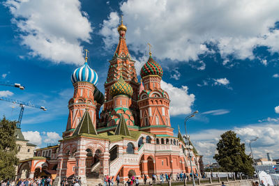 Low angle view of saint basils cathedral against cloudy sky