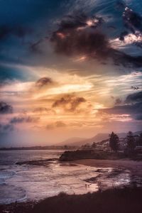 Scenic view of sea against sky during sunset