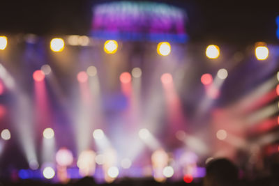 Defocused image of illuminated lights at night