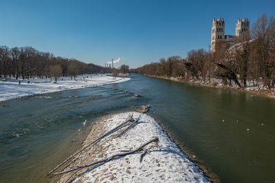 View of river in city during winter
