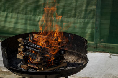 Close-up of fire on log