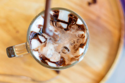 High angle view of coffee cup on table