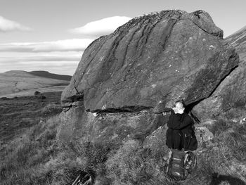 Full length of woman on mountain against sky