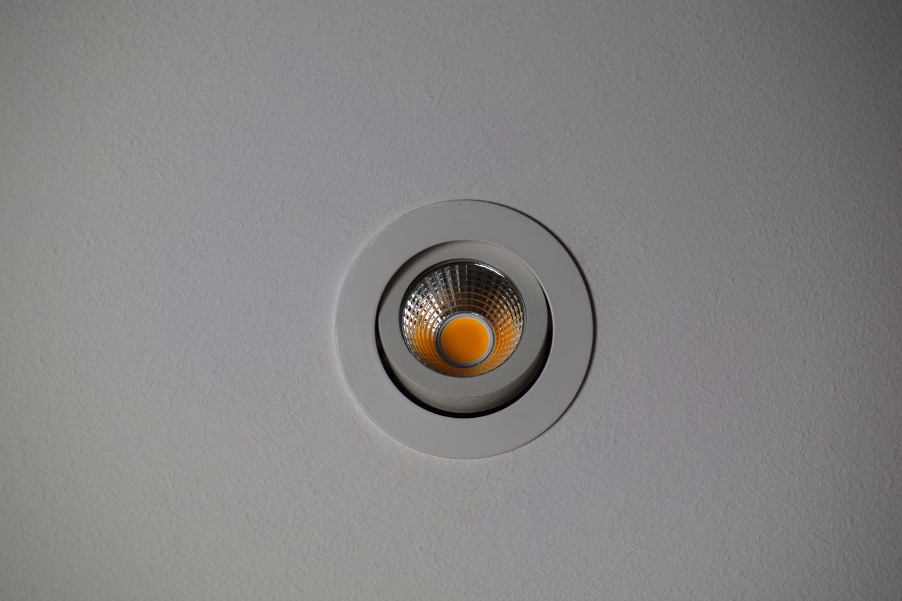 DIRECTLY ABOVE SHOT OF ELECTRIC LIGHT ON WALL