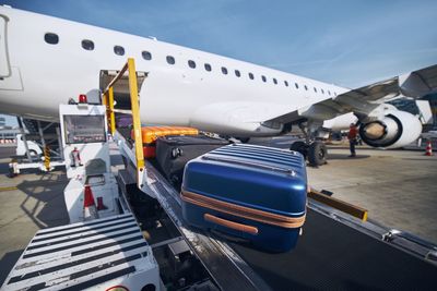 Low angle view of airplane against sky