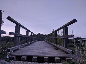 View of bridge on field against sky