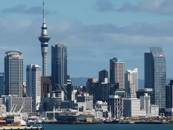 Modern buildings in city against sky