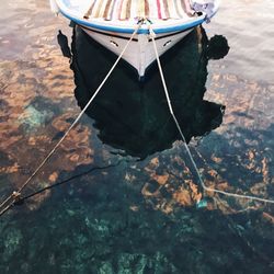 Boats moored in sea