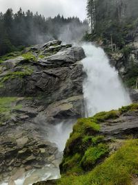 Scenic view of waterfall in forest