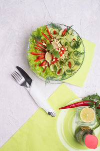 High angle view of fruits in plate on table