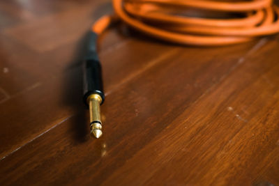 Close-up of jack on wooden table