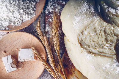 High angle view of bread on cutting board